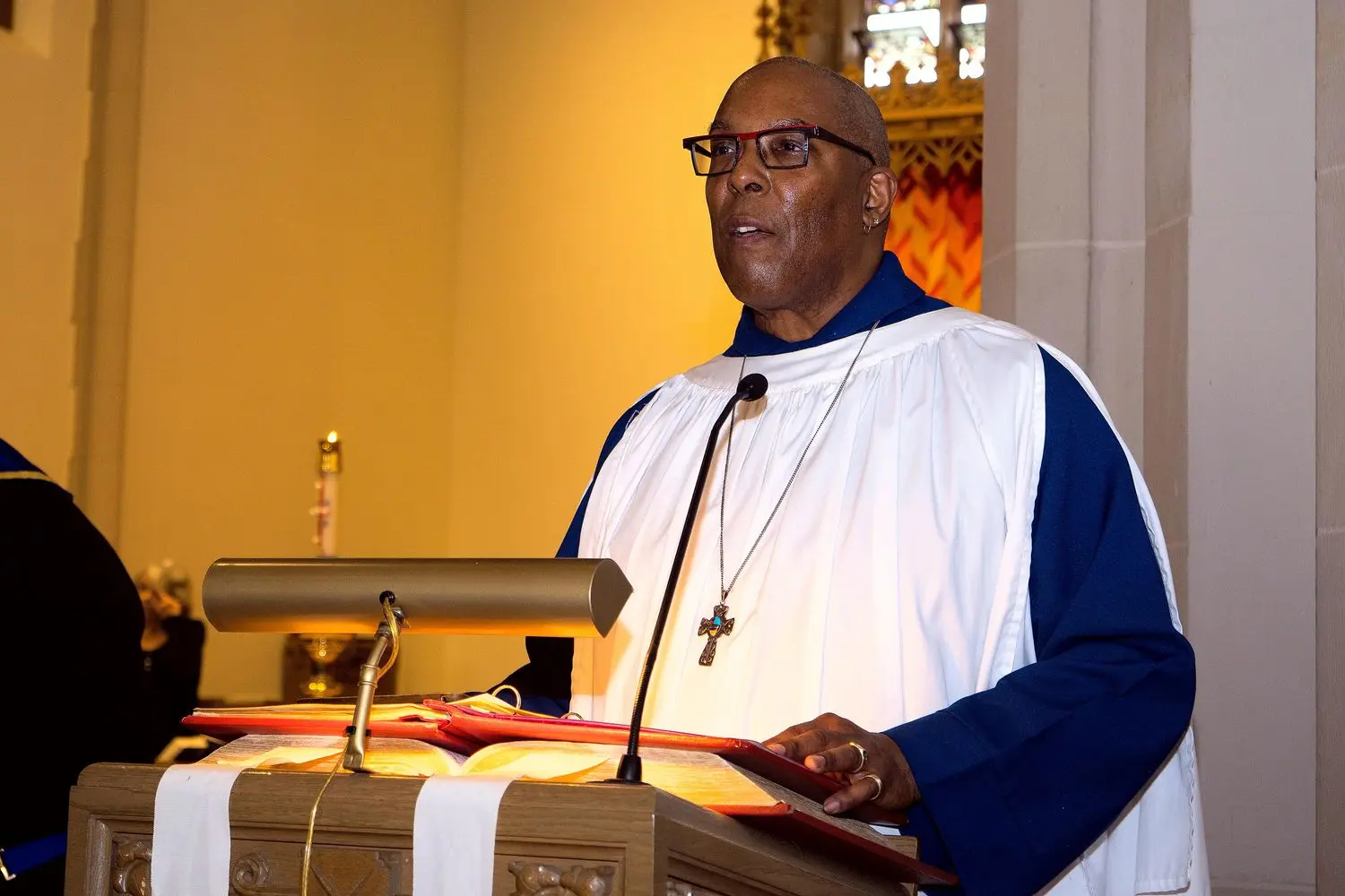 Pastor Michael preaching during a Sunday service at Grace Community Church.